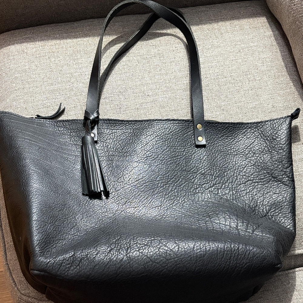 Portland Leather Black Tote with Tassel Accent